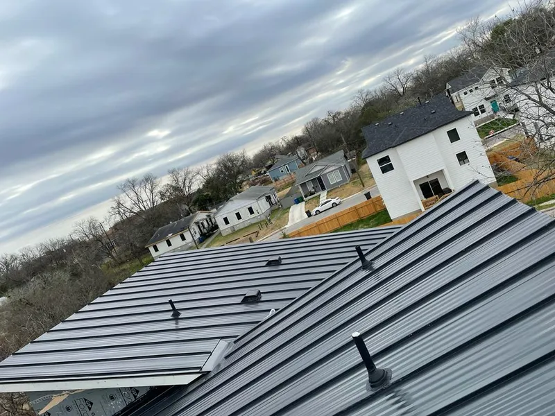 Standing seam metal roof panels with vents for Skylight Repair in Pearsall